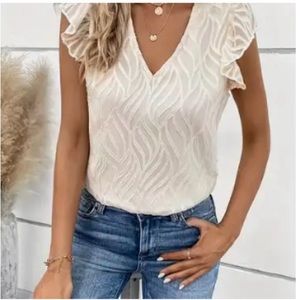 NWOT Women’s ruffled trim blouse